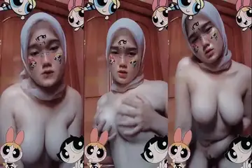 ABG Jilbab Susu Diremas Keras Desah Nafsu Liar poster